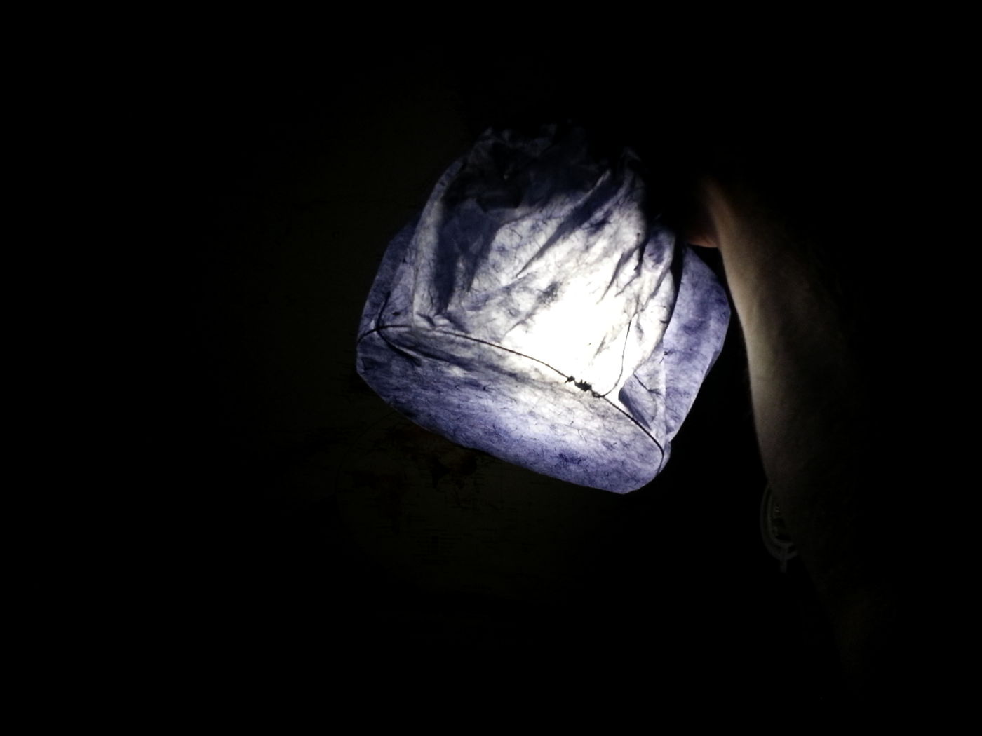 In the dark, a bunch of lanterns could replace a bed lamp